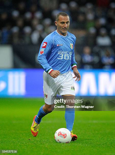 Angelo di Livio of Italy runs with the ball during the century match between Germany and Italy at Commerzbank Arena on October 14, 2012 in Frankfurt...