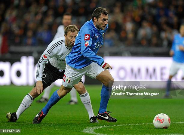 Guido Buchwald of Germany battles for the ball with Christian Vieri of Italy during the century match between Germany and Italy at Commerzbank Arena...
