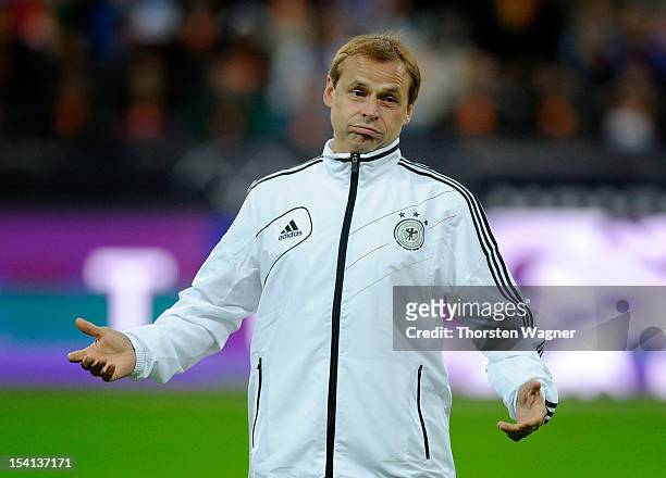 Olaf Thon of Germany looks on prior to the century match between Germany and Italy at Commerzbank Arena on October 14, 2012 in Frankfurt am Main,...
