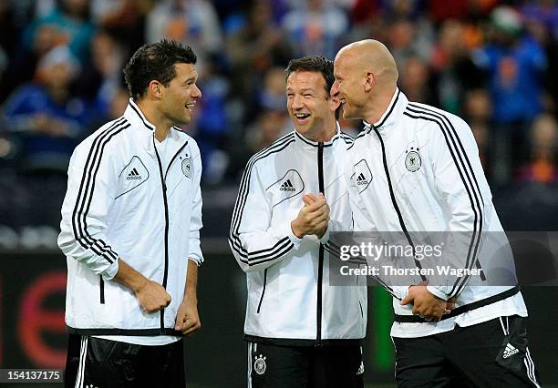 Michael Ballack, Freddi Bobic and Carsten Jankcer smile prior to the century match between Germany and Italy at Commerzbank Arena on October 14, 2012...