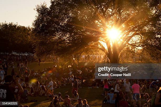 Fans rest under a tree at Zilker Park during the 2012 Austin City Limits Music Festival on October 14, 2012 in Austin, Texas.