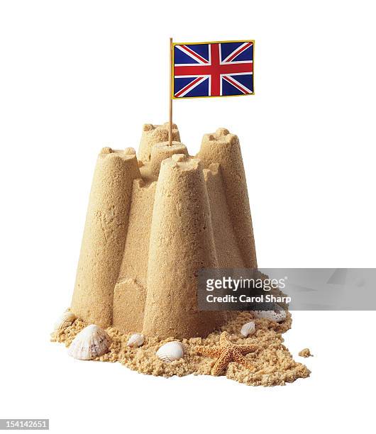 sandcastle with uk flag - sandcastle stock pictures, royalty-free photos & images