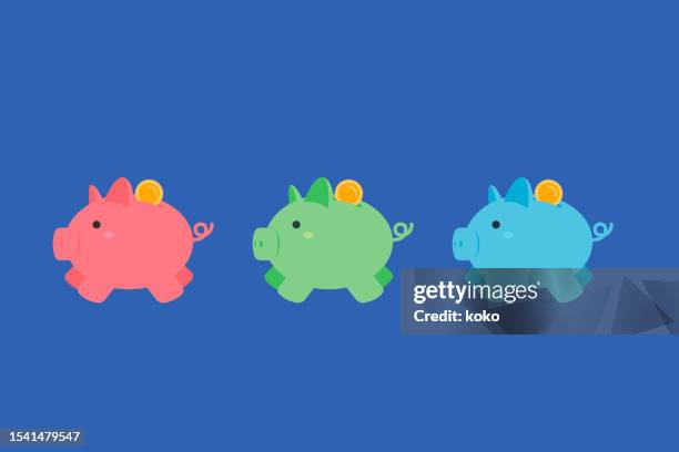 red, green, blue piggy bank. blue color background. - piggy bank stock illustrations