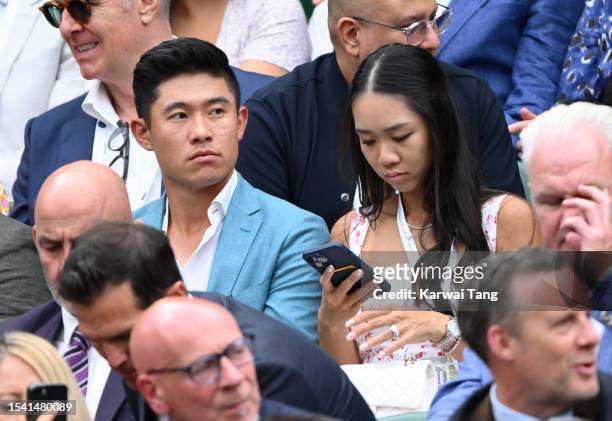 Collin Morikawa and wife Katherine Zhu attend day eleven of the Wimbledon Tennis Championships at All England Lawn Tennis and Croquet Club on July...