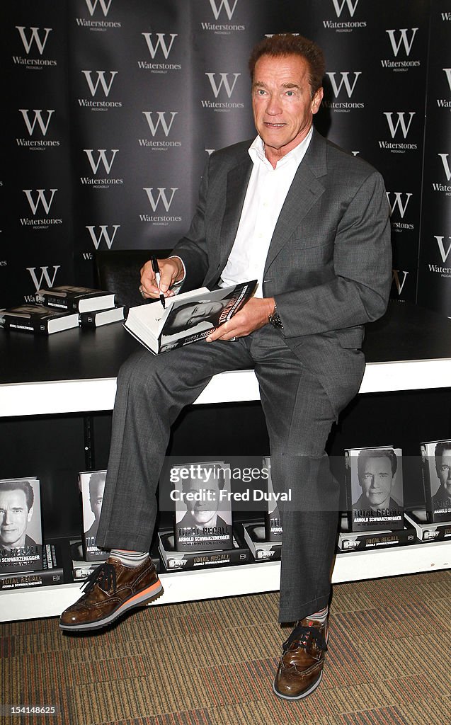 Arnold Schwarzenegger meets fans as he signs copies of his book... News