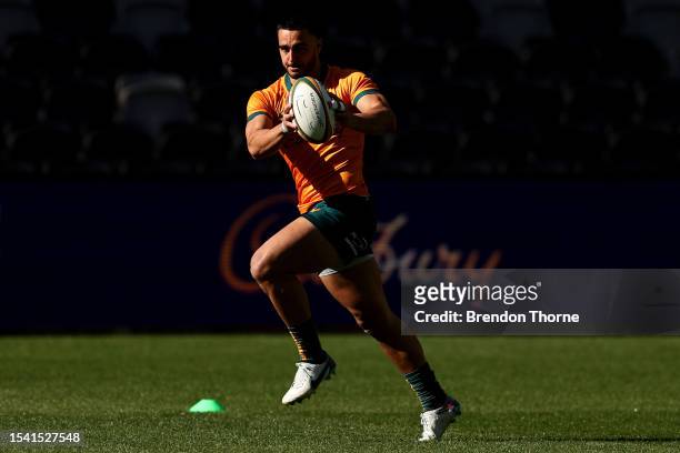 Tom Wright of the Wallabies runs the ball during an Australia Wallabies Captain's Run at CommBank Stadium on July 14, 2023 in Sydney, Australia.
