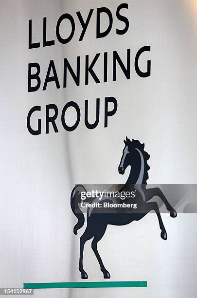 The Lloyds Banking Group Plc logo is displayed outside the bank's headquarters in London, U.K., on Monday, Oct. 15, 2012. U.S. Homeowners filed a...