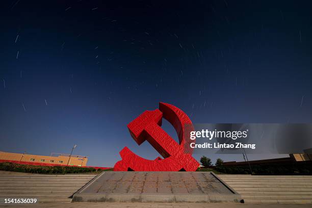 Sculpture of the Chinese Communist Party logo is seen in the Batu bay scenic area on July 12, 2023 in Wushen Banner, Ordos City, Inner Mongolia,...