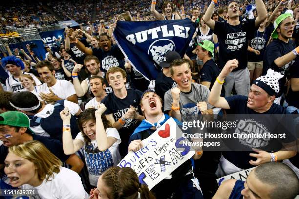 Jake Allen and other Butler fans erupt as Butler beat VCU 70-62 during the Semifinal matchup of the NCAA Final Four basketball game at Reliant...