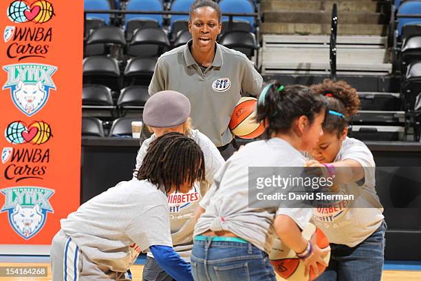 Taj McWilliams-Fraklin of the Minnesota Lynx participates at Dribble to Stop Diabetes WNBA FIT Clinic for youth from Minneapolis Southside Family...