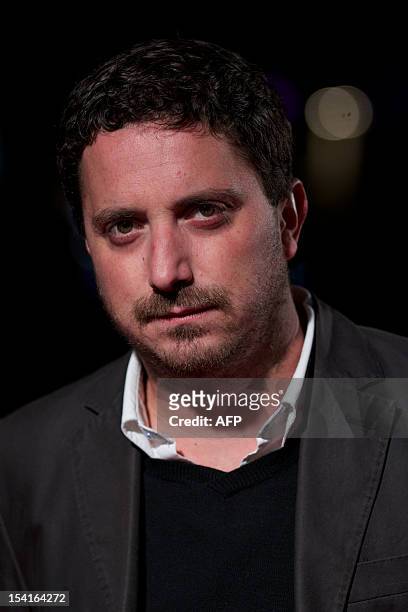 Chilean film director and screenwriter Pablo Larrain poses on the red carpet as he arrives to attend the premiere of his film 'No' during the 56th...