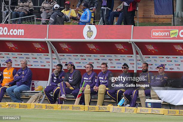 Kolkata Knight Riders players look on during the Karbonn Smart CLT20 match between Kolkata Knight Riders and Auckland Aces at Sahara Park Newlands on...