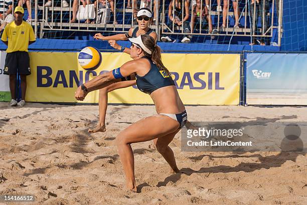 Maria Elisa Antonelli hits a return during the Women's Beach Volleyball Circuits Banco do Brasil at Centro Administrativo on October 12, 2012 in Belo...