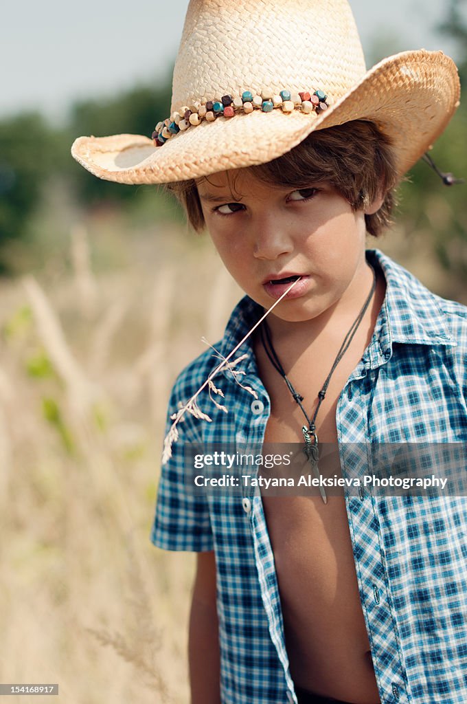 Small boy with cowboy hat