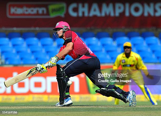 Steve Smith of the Sixers sweeps a delivery during the Champions League Twenty20 match between Chennai Super Kings and Sydney Sixers at Bidvest...