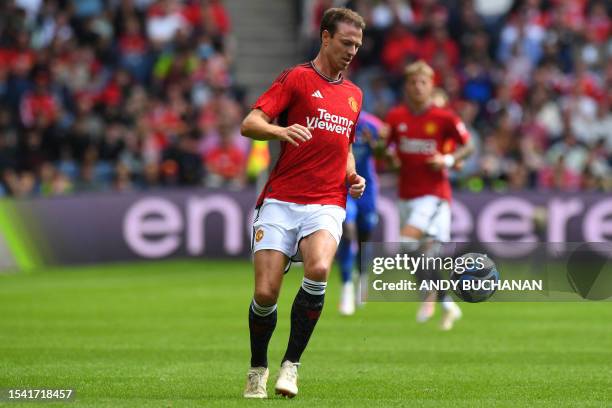 Manchester United's Northern Irish defender Jonny Evans controls the ball during the pre-season friendly football match between Manchester United and...