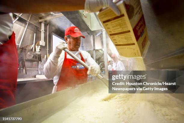 Pete Tovar stirs mashed potatoes while working in the H-E-B Mobile Kitchen in preparation for the 2011 H-E-B 6th Annual Feast of Sharing dinner at...