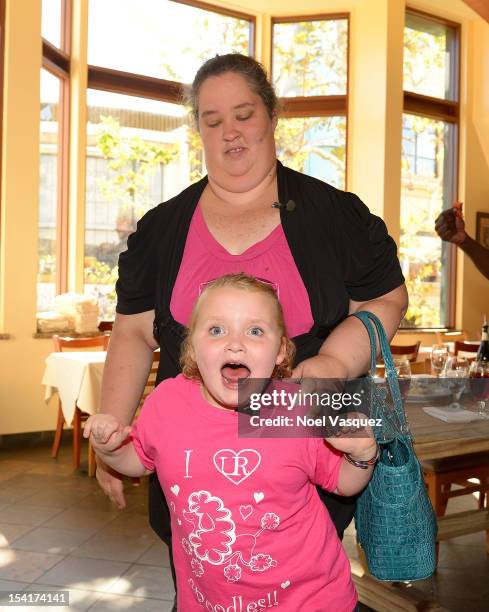 Alana 'Honey Boo Boo' Thompson and her mother June Shannon visit "Extra" at The Grove on October 15, 2012 in Los Angeles, California.