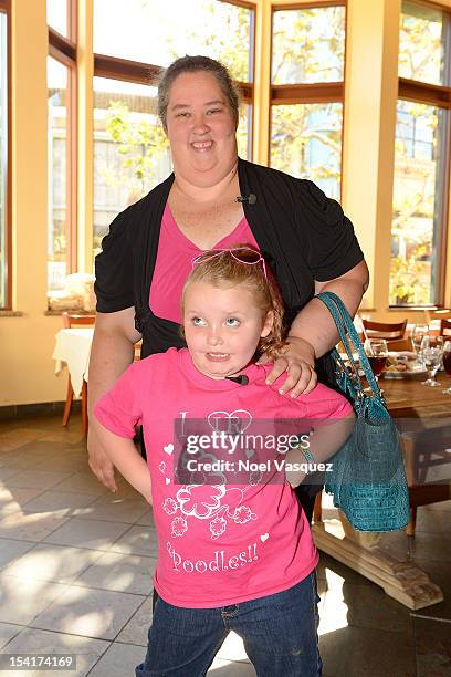 Alana 'Honey Boo Boo' Thompson and her mother June Shannon visit "Extra" at The Grove on October 15, 2012 in Los Angeles, California.