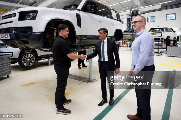 Britain's Prime Minister, Rishi Sunak, visits Land Rover for an announcement on a new electric car battery factory on July 19, 2023 in Warwick,...