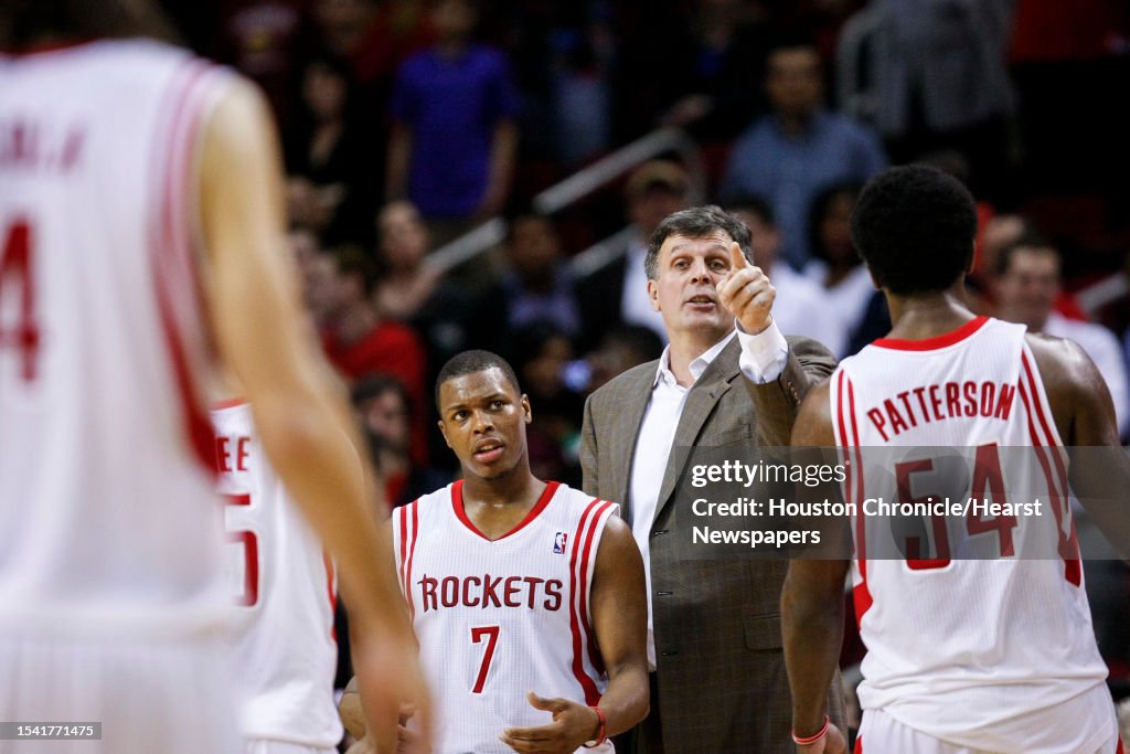 Houston Rockets head coach Kevin McHale talks to his team in the ...