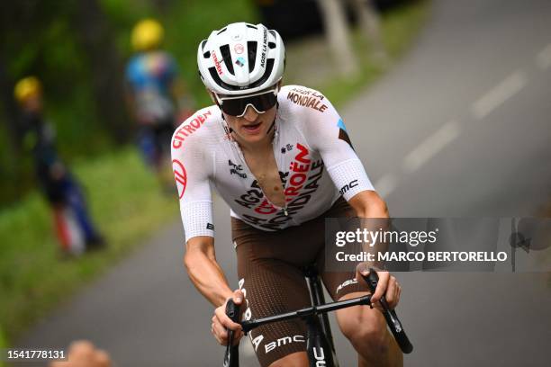 Citroen Team's Austrian rider Felix Gall cycles in a lone breakaway in the ascent of Col de la Loze in the final kilometres of the 17th stage of the...