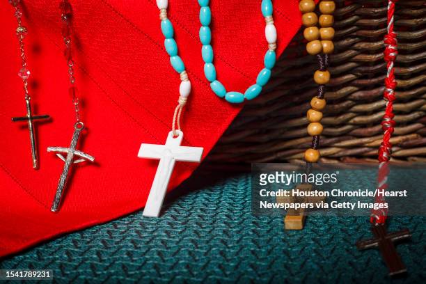 Rosaries sit in a basket waiting to be taken to Mexico with a group of parishioners from St. Jerome Catholic Community to see Pope Benedict during...
