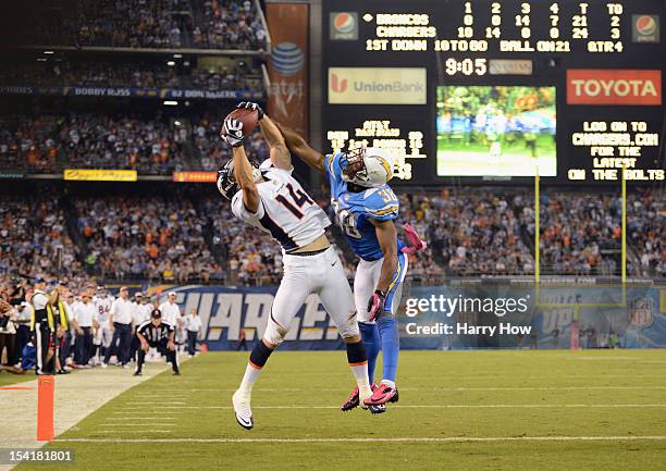 Brandon Stokley of the Denver Broncos makes the catch for a touchdown in the fourth quarter against Marcus Gilchrist of the San Diego Chargers during...