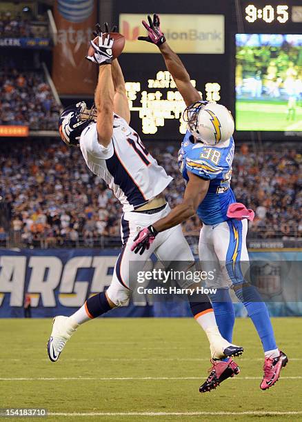 Brandon Stokley of the Denver Broncos makes the catch for a touchdown in the fourth quarter against Marcus Gilchrist of the San Diego Chargers during...