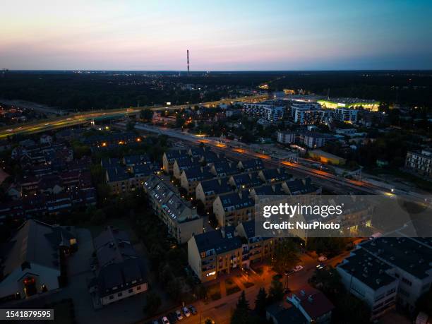 Residential neighbourhood is seen after sunset with the horizon visible on 13 July, 2023 in Warsaw, Poland.