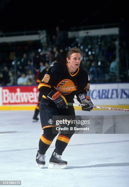 Igor Larionov of the Vancouver Canucks warms-up before an NHL game against the New York Islanders circa 1990 at the Nassau Coliseum in Uniondale, New...