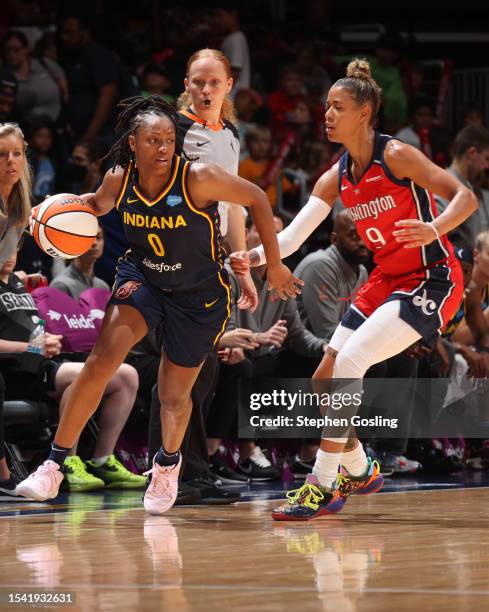 Kelsey Mitchell of the Indiana Fever handles the ball during the game on July 19, 2023 at Capital One Arena in Washington, D.C. NOTE TO USER: User...