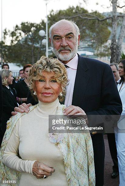 Sir Sean Connery and Lady Michelline arrive at a cocktail reception May 13, 2002 at the Yacht Club of Monaco in Monte Carlo. Established by founding...
