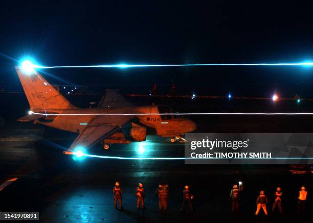 In this photo released by US Navy on March 20 a S-3 Viking assigned to the "Red Griffins" of Sea Control Squadron Three Eight is launched from the...