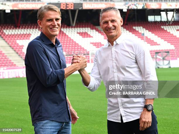 Red Bull Salzburg's outgoing sporting director Christoph Freund and Red Bull Salzburg's CEO Stephan Reiter pose for a photo at a press conference on...