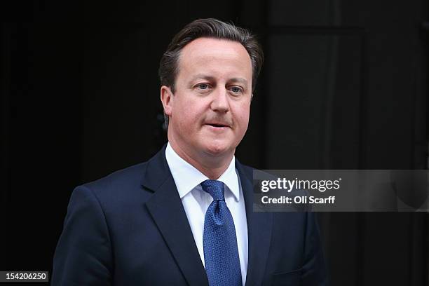 British Prime Minister David Cameron leaves Number 10 Downing Street after attending the weekly Cabinet meeting on October 16, 2012 in London,...