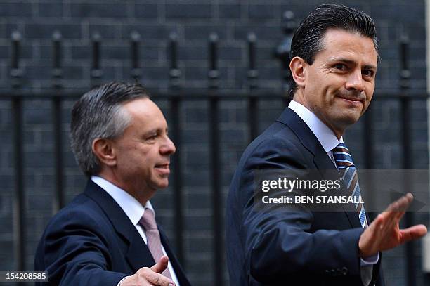 Mexican president-elect Enrique Pena Nieto leaves following a meeting with British Prime Minister David Cameron at 10 Downing street in central...