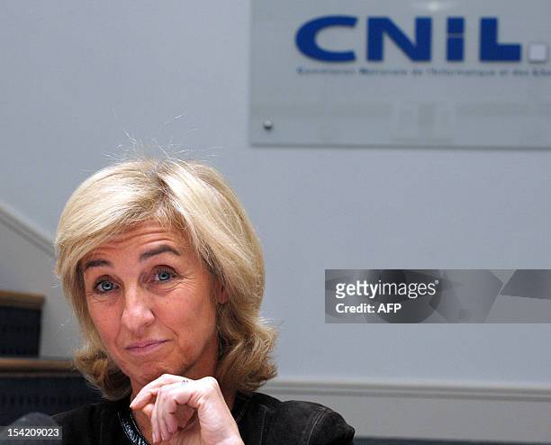France's computer technology watchdog Cnil head Isabelle Falque-Pierrotin listens during a press conference at the Cnil' headquarters in Paris on...