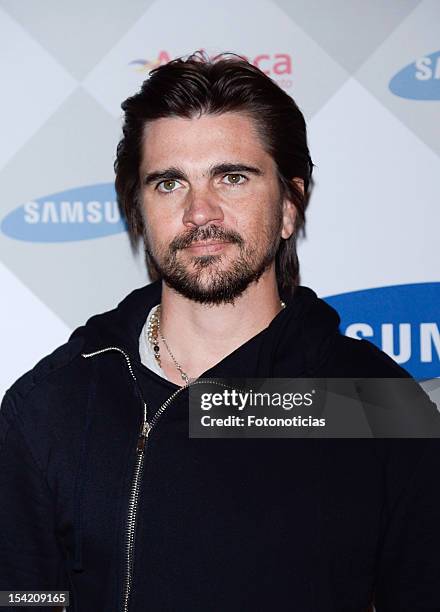 Singer Juanes attends a photocall to present the 'MTV Unplugged' Tour at the Colombian Embassy on October 16, 2012 in Madrid, Spain.