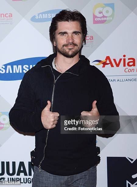 Singer Juanes attends a photocall to present the 'MTV Unplugged' Tour at the Colombian Embassy on October 16, 2012 in Madrid, Spain.