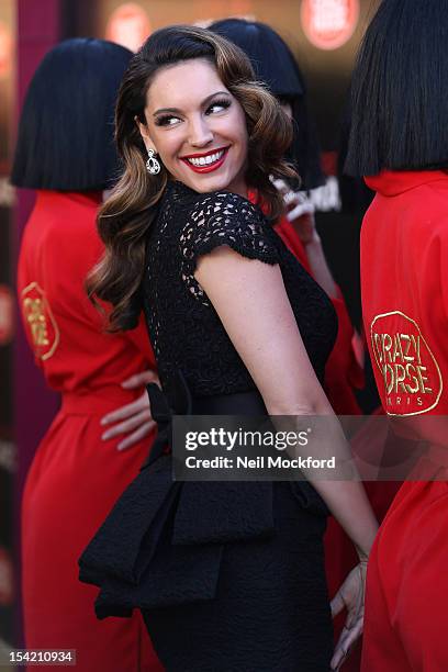 Kelly Brook poses at a photocall as she joins the cast of Crazy Horse at The National Theatre on October 16, 2012 in London, England.