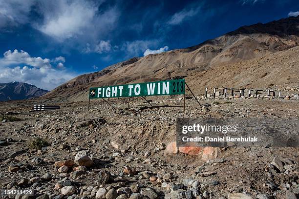 An Indian Military banner post is seen on the road to Pangong Lake on October 5, 2012 near to Leh, Ladakh, India. Ladakh, nestled between the Kunlun...