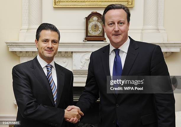 British Prime Minister David Cameron greets Mexican President-elect Enrique Pena Nieto at Number 10 Downing Street on October 16, 2012 in London,...