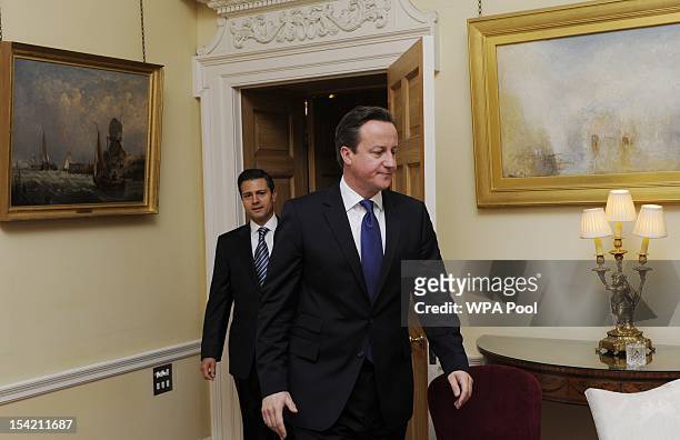 British Prime Minister David Cameron greets Mexican President-elect Enrique Pena Nieto at Number 10 Downing Street on October 16, 2012 in London,...
