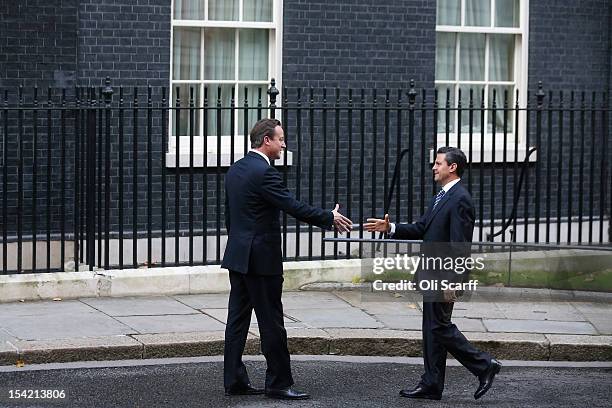 British Prime Minister David Cameron greets Mexican President-elect Enrique Pena Nieto outside Number 10 Downing Street on October 16, 2012 in...