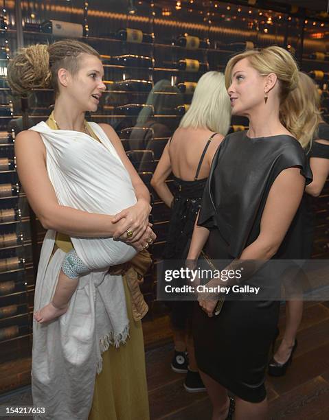 Nike Kondakis and actress Mena Suvari attend GenArt's 14th Annual Fresh Faces In Fashion Intimate Dinner at Andaz on October 15, 2012 in West...