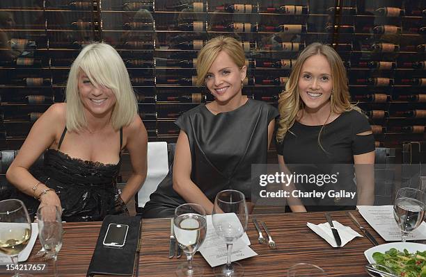 Stylist Taylor Jacobsen, actress Mena Suvari, and VP of Strategic Partnerships, GenArt Katie May attend GenArt's 14th Annual Fresh Faces In Fashion...