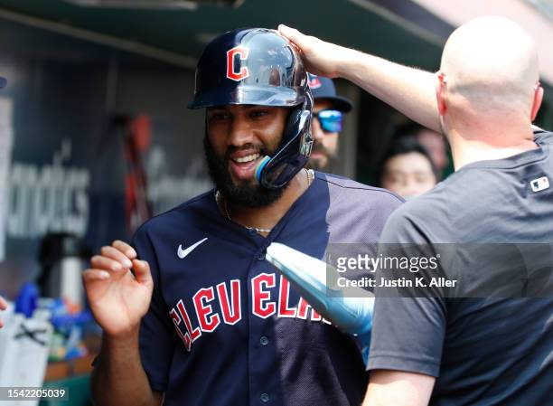 Amed Rosario of the Cleveland Guardians celebrates after scoring on a RBI single in the fifth inning against the Pittsburgh Pirates during...