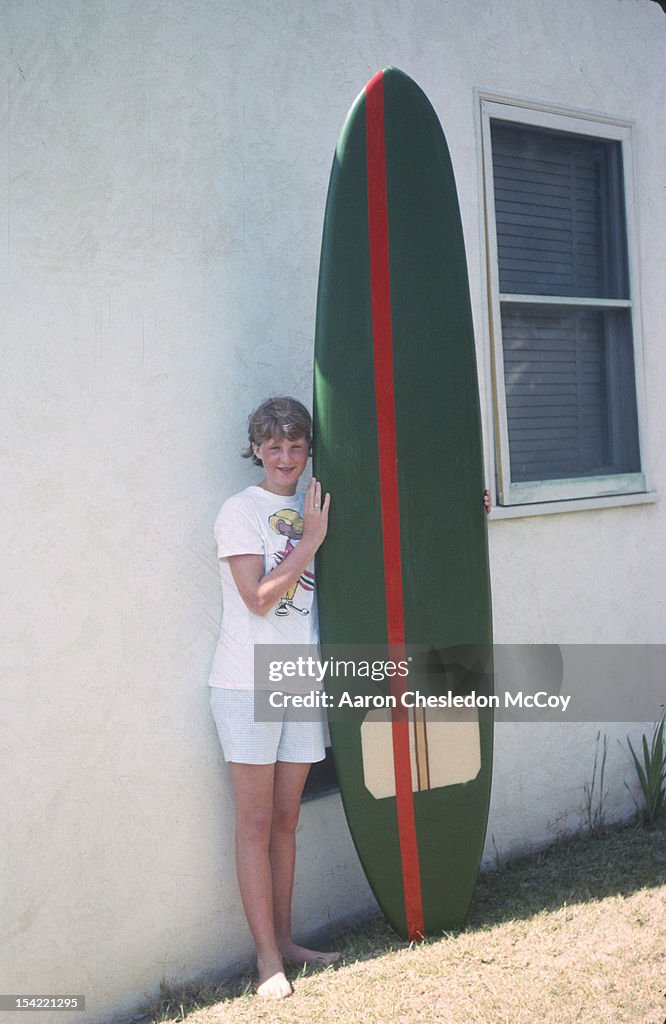 Woman with surfboard