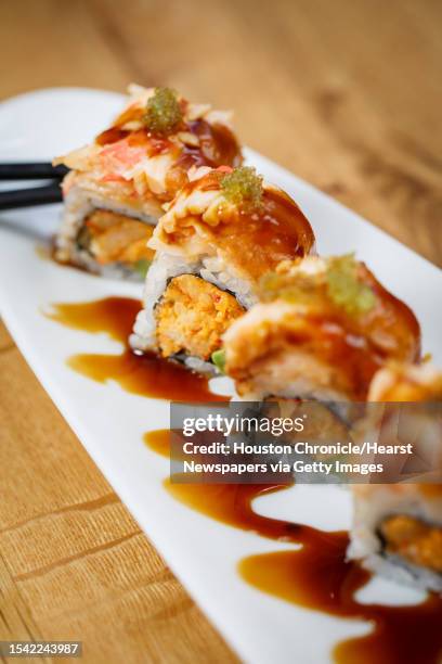 Crawfish, avocado, tempura flakes, snow crab, spicy tuna, wasabi tobiko and eel sauce, at the Fish & the Knife restaurant, Tuesday, March 18 in...